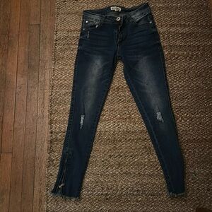 Woman Size 3 skinny jeans, Zippers on the bottom near ankle